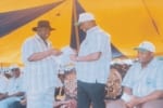 Rivers State Governor, Rt. Hon. Chibuike Amaechi (middle) recieving an address from the the state chairman of Nigerian Labour Congress, Comrade Chris Oruge while the state Deputy Governor Engr.Tele Ikuru, watches with interest  during a Workers Day celebration in Port Harcourt. Photo: King Osila