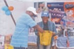 jul2709bus18 MD/CEO, Neighbourhood Micro-Finance Bank Ltd, Port Harcourt, Mr Friday Amadi, picking a winning number for the star prize at the bank’s promo draw held in Port Harcourt, recently. Photo: Prince D. Obinna