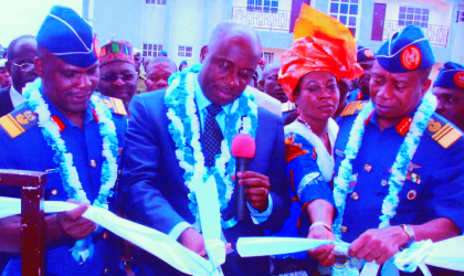 Rivers State Governor, Rt. Hon. Chibuike Rotimi Amaechi (2nd left) cutting the tape to commission the Nigeria Airforce Foundation Home Ownership Scheme. He is flanked  by Chief of Air Staff, Air Marshall Oluseyi Petirin (right) and wife, and Air Vice Marshall Lucky Aramile, during the commissioning of prototype buildings, at the foundation Harmony Estate,  Port Harcourt, yesterday