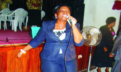 Wife of the Rivers State Governor, Dame Judith Amaechi leading the praise and worship session  during the weekly interdenominational fellowship at Government House, Port Harcourt, after her recovery from  a fracture.