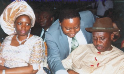 Rivers State Governor, Rt Hon Chibuike Rotimi Amaechi (right) in a chat with the Commissioner for Finance, Mr George Feyii  at the Accountability Forum at Alfred Diete Spiff Civic Centre, Port Harcourt, while wife of the governor, Dame Judith Amaechi watches, last Monday.