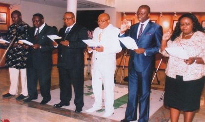 Cross section of six new commissioners sworn in Wednesday by Rivers State Governor, Rt Hon Chibuike Rotimi Amaechi taking the oath of office at Government House, Port Harcourt. Photo: Chris Monyanaga