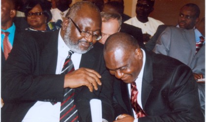 Mr O.C.J Okocha (SAN)(left) listens to Dr Theo Osanakpo (SAN) during the stakeholders meeting with Rivers State Governor, Rt Hon Chibuike Rotimi Amaechi at Government House, Port Harcourt, recntly. Photo: Chris Monyanaga