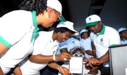Wife of Bayelsa State Governor, Mrs. Alanyingi Sylva (2nd left) testing a patient, during the World Sight Day 2009, while Dr. (Mrs) Udom, President, African Council of Optometry (1st left) and Dr. Obibi Usiwo, Coordinator (right) watch.