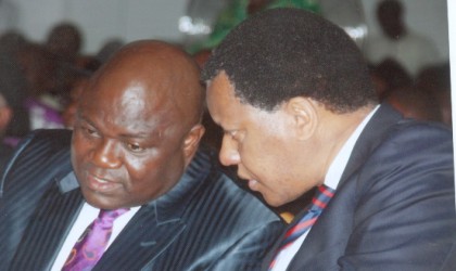 Minister of State for Petroleum, Mr Odein Ajumogobia (SAN) (right) in a chat with the Speaker, Rivers State House of Assembly, Rt Hon Tonye Harry during the accountability forum addresed by Governor Amaechi at Alfred Diete Spiff Civic Centre, Port Harcourt, last Monday. Photo: Chris Monyanaga