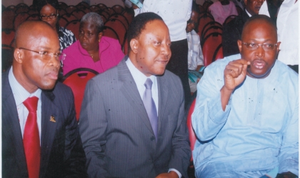 nov09110901 Rivers State Commissioner for Health, Dr Sampson Parker (right) discussing with his counterparts of the Finance and the Urban Development Ministries, Hon George Feyii (centre) and Barrister Osima Ginah respectively at the launch of the State Government E-Service Portal in Port Harcourt, recently.