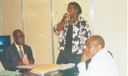 Rivers State Commissioner for Information, Mrs Ibim Seminatari addressing participants during Ministry of Information Retreat at Riviera Homes, Ernest-Ikoli street, Port Harcourt yesterday, while Permanent Secretary, Ministry of Information, Dr Godwin Mpi (right) and the Director of Administration in the Ministry, Mr John Bamson watch. Photo: Nwiueh Donatus Ken