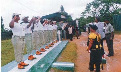 Commissioner for Informamtion, Mrs Ibim Seminatari (right) who represented the state governor, Rt Hon Chibuike Rotimi Amaechi, taking the salute as guest of honour at the NYSC Orintation Camp, Nonwa Gbem, Tai LGA, Rivers State, Wednesday.