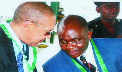 Chairman of the occasion and Chief Executive Officer, Silverbird Communications, Ben Murray Bruce (left) conferring with Permanent Secretary, Ministry of Information, Dr Godwin Mpi, who represented the Information Commissioner, during the formal opening ceremony of NUJ Press Week, Rivers Council, on Monday. Photo: Chris Monyanaga