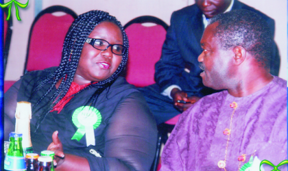 Representative of the Governor of Rivers State and Commissioner for Information and Communication, Mrs Semenitari Ibim (left), explaining a point to chairman of the occasion, Senator, Dr, Ben Birabi, during the Buffet/Award Night to climax the Nigeria Union of Journalists, Rivers State Council, 2009 Press Week, at Hotel Presidential, Port Harcourt, last Friday.