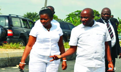 Governor Chibuike Rotimi Amaechi of Rivers State, explaining a point to his wife, Judith, at the Rumuokwuta/Choba project site, during an inspection exercise, yesterday.