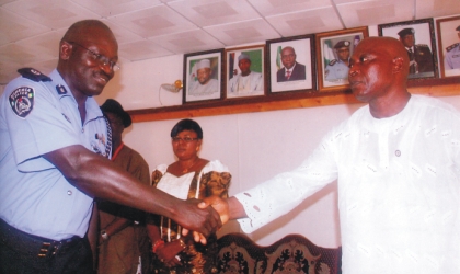 Rivers State Commissioner of Police, Mr Suleiman Abba (left) in a handshake with chairman, Caretaker Committee, Police Community Relations Committee, Rivers State, Dr Suku Harry, while other members watch, during the meeting of the PCRC in Port Harcourt, last Friday.