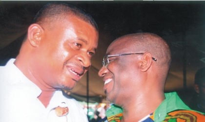 jan081001 Senator Lee Maeba (left) chatting with MOSOP President, Barr Ledum Mitee, during the 18th Ogoni Day celebration held at Bori, last Monday. Photo: Chris Monyanaga.