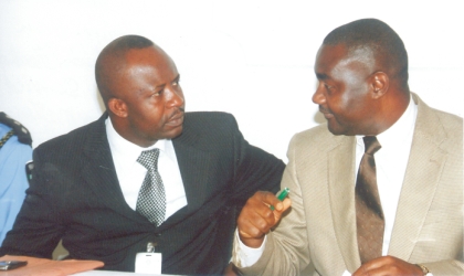 jan081002 Representative of Rivers State Governor and Secretary to State Government, Hon. Magnus Abe (right) conferring with State Commissioner for Local Government and Chieftaincy Affairs, Hon Tammy Danagogo, during the meeting of Kula Community, State Security Service and State Government, on Kula Chieftaincy Matters, at the SSS office in Port Harcourt, yesterday. Photo: Chris Monyanaga