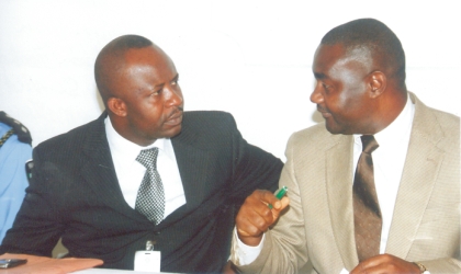 Representative of Rivers State Governor and Secretary to State Government, Hon. Magnus Abe (right) conferring with State Commissioner for Local Government and Chieftaincy Affairs, Hon Tammy Danagogo, during the meeting of Kula Community, State Security Service and State Government, on Kula Chieftaincy Matters, at the SSS office in Port Harcourt, yesterday. Photo: Chris Monyanaga