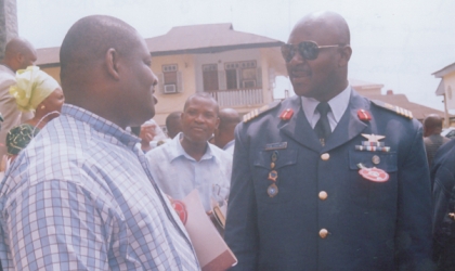 Deputy Governor of Rivers State, Engr Tele Ikuru (left) conferring with Group Captain Charles O. Ohwo, during 2010 Armed Forces Remembrance Day celebration,  at St Cyprians church, Port Harcourt,  last Sunday