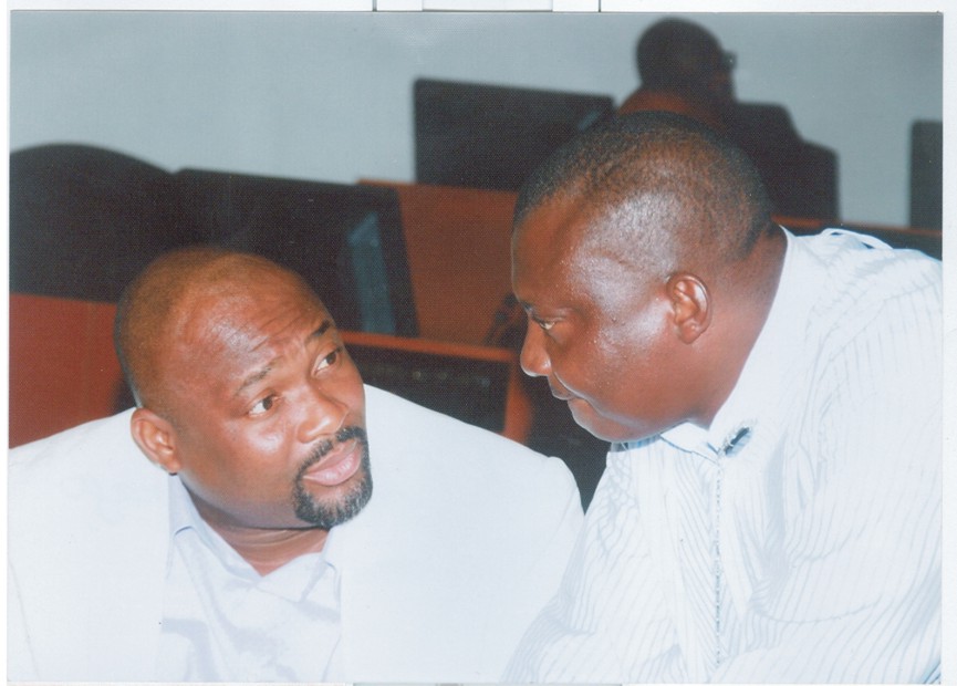 Deputy Speaker, Rivers State House of Assembly, Hon Dumnamene Deekor (right) conferring with the leader of the House, Hon Chidi Lloyd during a sitting of the House,last Thursday.