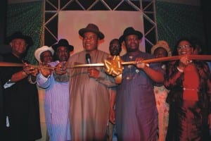 Chief Vincent Ogbulafor, National Chairman, Peoples Democratic Party (PDP) (4th left) cutting a tape to unveil the Mascot/Logo of the 17th National Sports Festival. With him are Engr. Tele Ikuru, Rivers State, Deputy Governor (3rd right), his Anambra State Counterpart, Dame Virginia Etiaba, Alabo Tonye Graham-Douglas, former Minister of Sports, and other dignitaries, in Port Harcourt, last Tuesday.