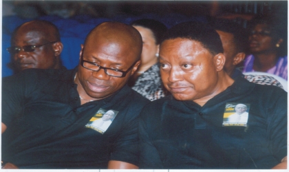 Rivers State Commissioner for Finance, Hon George Feyii (right) listen to Hon Gogo Levi Charles, Commissioner for Budget, during the service of songs in honour of late Hon Moses Ahubele, Commissioner for Employment Generation and Empowerment at the Civic Centre, Port Harcourt, Wednesday. Photo; Chris Monyanaga