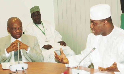 INEC Chairman, Prof Maurice Iwu (left), Listening to the Speaker, House of Representatives, Dimeji Bankole, during the visit of INEC officials  to the leadership of the House in Abuja, last  Friday.