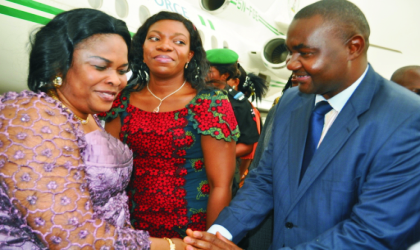 Secretary to Rivers State Government, Hon Magnus Abe (right) welcoming wife of the Acting President, Dame Patience Jonathan.  With them, is wife  of the Rivers State Deputy Governor, Dr. Mina Ikuru, at the Port Harcourt International Airport, Omagwa, yesterday. Photo: NAN