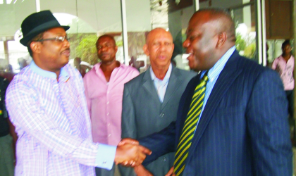 Commissioner for Health, Dr Sampson Parker (left) in a handshake with the General Manager, East, Skye Bank PLC, Mr Chike Meneh, while the Permanent Secretary Ministry of Health, Dr Anthony Nwiado  (2nd right) watches,  during the bank’s presentation of insecticide treated net, at the ministry, yesterday.