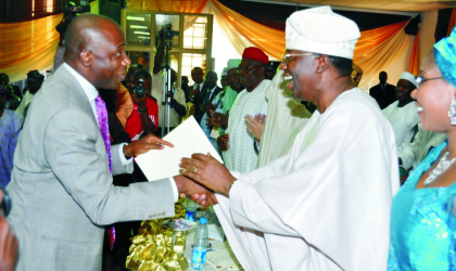05041002 Rivers State Governor, Rt.Hon. Chibuike Rotimi Amaechi (left) congratulates Governor of Ogun State, Otunba Gbenga Daniel, during his 54th birthday celebration in Abeokuta, recently.