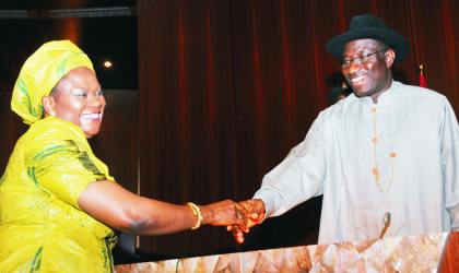 07041001 Acting President Goodluck Jonathan (right),congratulating the Minister of Information and Communications, Prof. Dora Akunyili,during the swearing-in ceremony in Abuja, yesterday. Photo: NAN