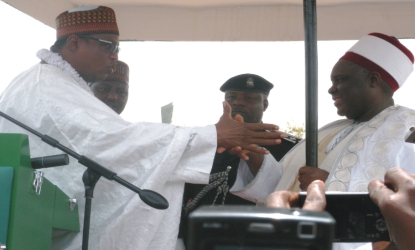 Gov Ibrahim Gaidam (left), Congratulates Alhaji Muhammadu Abali Ibn Muhammadu Idrissa, the new Emir of Fika and Chairman, Yobe State Council of Chiefs, after presenting him with his staff of office. Photo: NAN