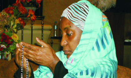 Former First Lady, Turai Yar'adua praying for the repose of her late husband, President Umaru Yar'Adua's soul at the State House Abuja, on Thursday.