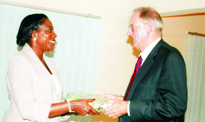 Dame Aleruchi Cookey-Gam, Administrator, Greater Port Harcourt Authority Board  (left) presenting a souvenir to Dr Jonathan Fanton, the immediate past president, MacArthur Foundation, during an official commissioning of its country office  in Port Harcourt, recently. Photo: Chris Monyanaga