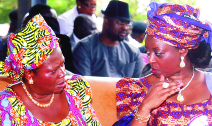 Minister of Petroleum, Mrs Diezani Allison-Madueke (right) conferring with the Minister for Information and Communications, Prof Dora Akunyili at the 26th Convocation ceremonies of the University of Port Harcourt, Saturday. Photo: Chris Monyanaga