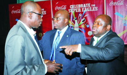 L-R: Director-General, National Sports Commission, Patrick Ekeji, President, Nigeria Football Federation, Sani Lulu and Secretary-General, Bolaji Ojooba, at the send forth dinner for the Super Eagles in Abuja on Friday.