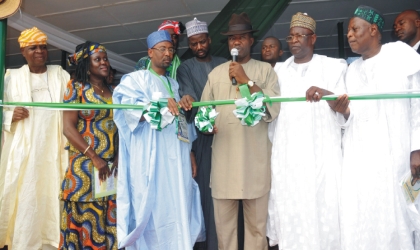 Representative of the President and Minister of Special Duties, Capt. Caleb Olubolade, rtd, (3rd left) flanked by other ministers cutting the tape to declare open the 3rd African Arts and Craft Expo (AFAC) 2010 in Abuja, yesterday.
