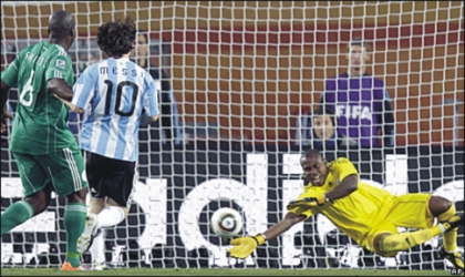 13061001 Super Eagles’ Goal Keeper, Enyeama, trying to save the ball from entering the net, during the match with Argentina, yesterday