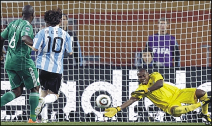 Super Eagles’ Goal Keeper, Enyeama, trying to save the ball from entering the net, during the match with Argentina, yesterday