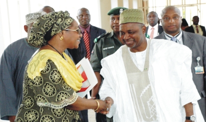 23061001 Vice President Namadi Sambo (right) in a handshake with Chairman, Economic and Financial Crimes Commission (EFCC), Mrs Farida Waziri after a meeting at the Presidential Villa in Abuja, yesterday.