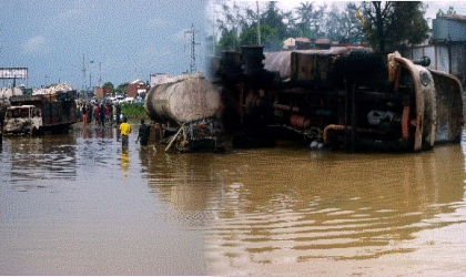 FRED18061001 The accidented petrol tanker at kilometre 17 Port Harcourt-Aba express road spilling its contents before bursting into flames, yesterday. Photo: Prince Dele Obinna