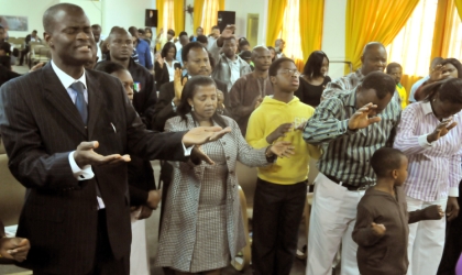 FRED21061001 Nigerians worshipping at the Redeemed Christian Church of God, House of Gold Parish, Edenvale, Johannesburg, South Africa, yesterday.