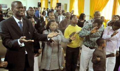 Nigerians worshipping at the Redeemed Christian Church of God, House of Gold Parish, Edenvale, Johannesburg, South Africa, yesterday.