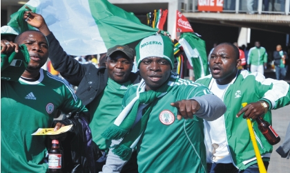 fredjun141001 Nigerians in South Africa cheering the Super Eagles, during their 2010 FIFA World Cup Group B match against Argentina, last Saturday.