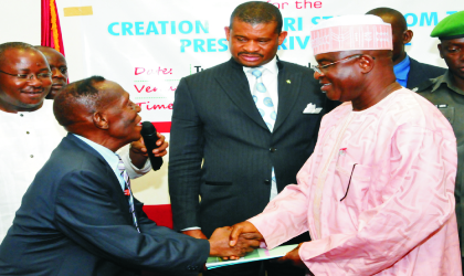 Senate President, David Mark (right) receiving a Memorandum for the creation of Bori State from the Chairman,Bori State Movement, Dr Cyrus Gbene Nunieh  in Abuja, last Tuesday. With them is Senator Lee Maeba