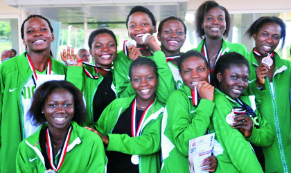 FRED11081003 Members of the Nigerian U-18 team that won silver medal in Africa Nation for Women Basketball Championships, at a reception in Abuja, yesterday