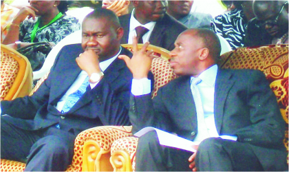 FRED181001 Governor Chibuike Rotimi Amaechi of Rivers State (right) with Secretary to the State Government, Hon Magnus Abe during the passing out ceremony of Batch ‘C’ 2009 corps members at Isaac Boro Park, Port Harcourt, last Thursday
