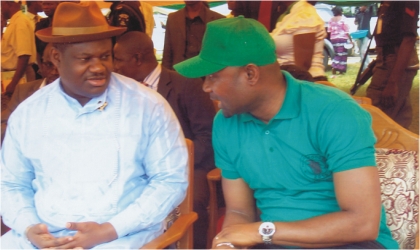 Representative of Rivers State Governor and Deputy Governor of the state, Engr Tele Ikuru (left) listening to Commissioner for Agriculture, Hon Emmanuel Chinda, during the 2010 World Food Day celebration, organised by the state Ministry of Agriculture at Isaac Boro Park, Port Harcourt, recently.