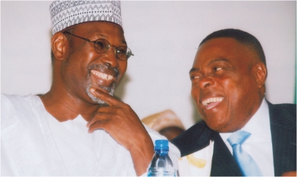 Chairman, National Independent Electoral Commission (INEC), Prof Attahiru Jega (left) chatting with chairman, Rivers State Independent Electoral Commission, Prof Nimi Briggs, during the presentation of a report, on the 2008 LGA elections  in Port Harcourt, yesterday