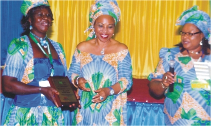 General Manager, External Relations, Nigeria Liquefied Natural Gas (NLNG),Siene Allwell-Brown (middle), Head, Economic Empowerment of the company, Emily Green-Nwodim (right) and Mrs Mojiba Harry, a beneficiary during NLNG’s Economic Empowerment Development Day held in Port Harcourt, last Wednesday.