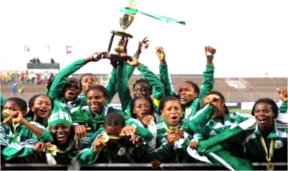 FRED15111001 Super Falcons celebrating after winning the AWC title in South Africa, yesterday.