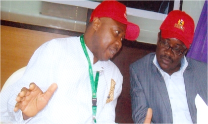 FRED15111002 Managing Director, Rivers State Sustainable Development Agency, Mr Noble D. Pepple (left) conferring with Chairman, House Committee on RSSDA, Hon Ibroma Kitchener during send-forth for the beneficiaries of the Rivers State Government Overseas Technical Skills Training Programme organised by RSSDA and UNITAR at the agency’s Conference Hall, in Port Harcourt, last Friday. Photo: Nwiueh Donatus Ken