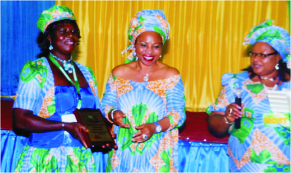 FRED19111002 General Manager, External Relation, Nigerian Liquefied Natural Gas, Siene Allwell-Brown (middle) Head, Economic Empowerment Dept, NLNG, Emily Green-Nwodim (right) and Mrs Mojiba Harry, a beneficiary, during NLNG’s Economic Empowerment Development Day, in Port Harcourt, recently. Photo: Chris Monyanaga